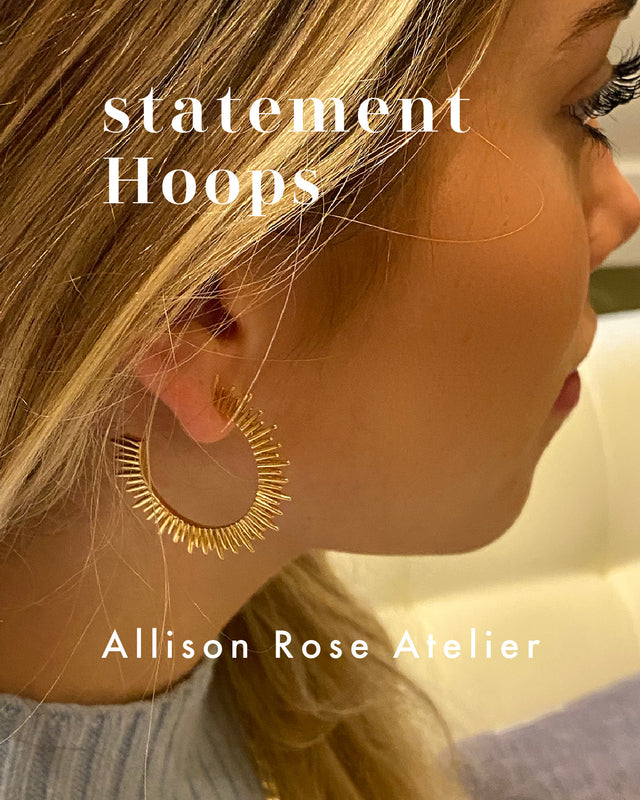 Statement Hoop earrings by Allison Rose Atelier. Gold Hoop earrings in gold and silver plating. Create a curated unique and elevated look with our statement hoop earrings. From Bold Chunky Hoops, Dangle Hoops, Triple Strand, and Spiked Hoops shop them